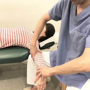  A woman's arm is being treated
